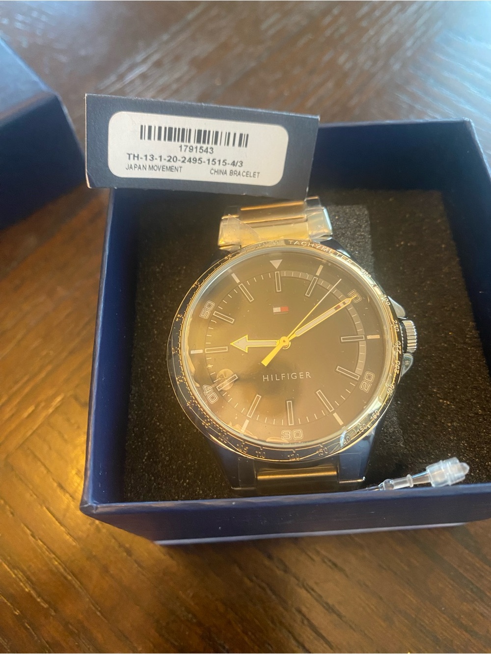 Tommy Hilfiger Black and Gold Men's Stainless Steel Watch